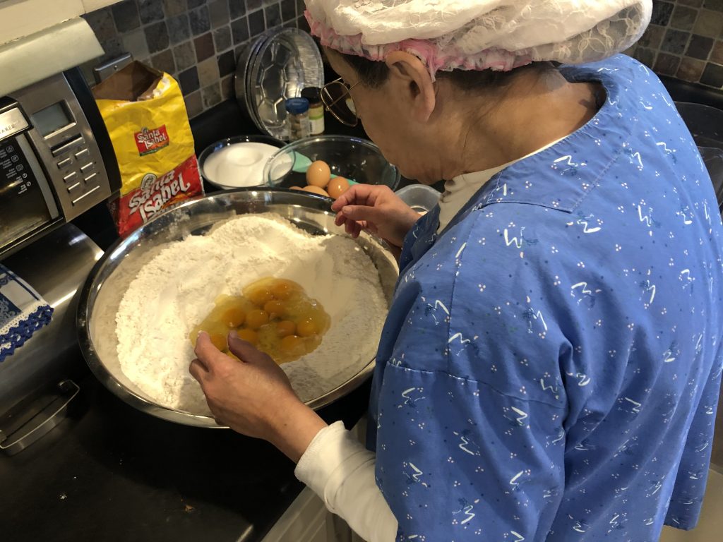 Natalia's mom cooking